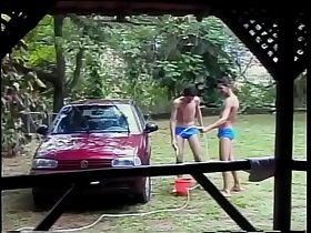 Young curly tutti frutti Wellington helps his neighbour to find the problem with spark advertising fouling of his car